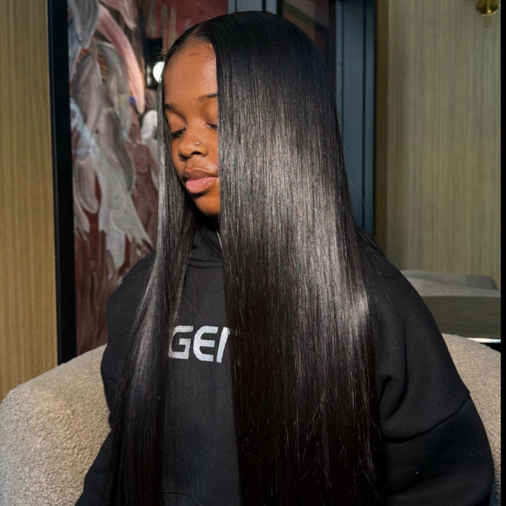 Middle Part Buss Down Quick Weave at Prestige Beauty Lounge in Pittsburgh, PA