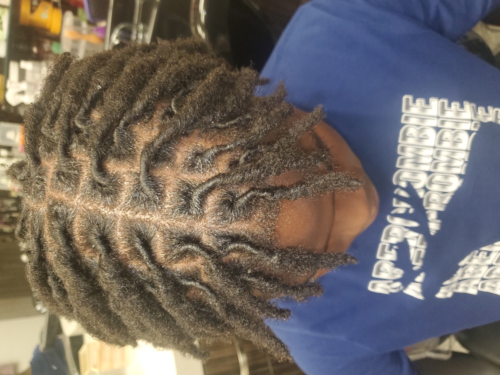 Kids Loc Retwist (Half Head) at Josephine's Girls Hair Studio💜🦋 in Houston, TX