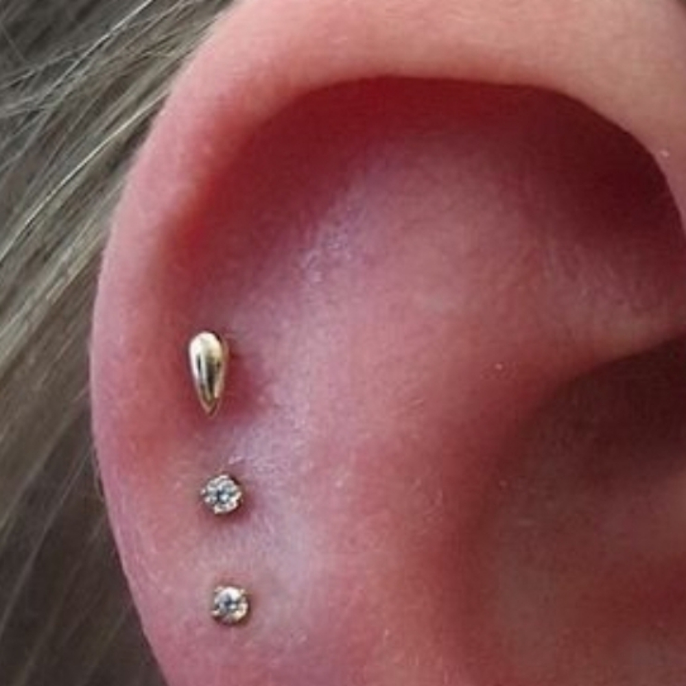 Triple Helix Piercing at Gilded Needle in BRENTWOOD, CA
