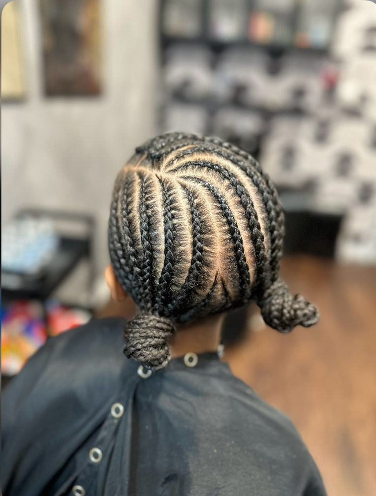 Braided style (Added Hair) at Ashley Nicole Hair in Dallas, TX