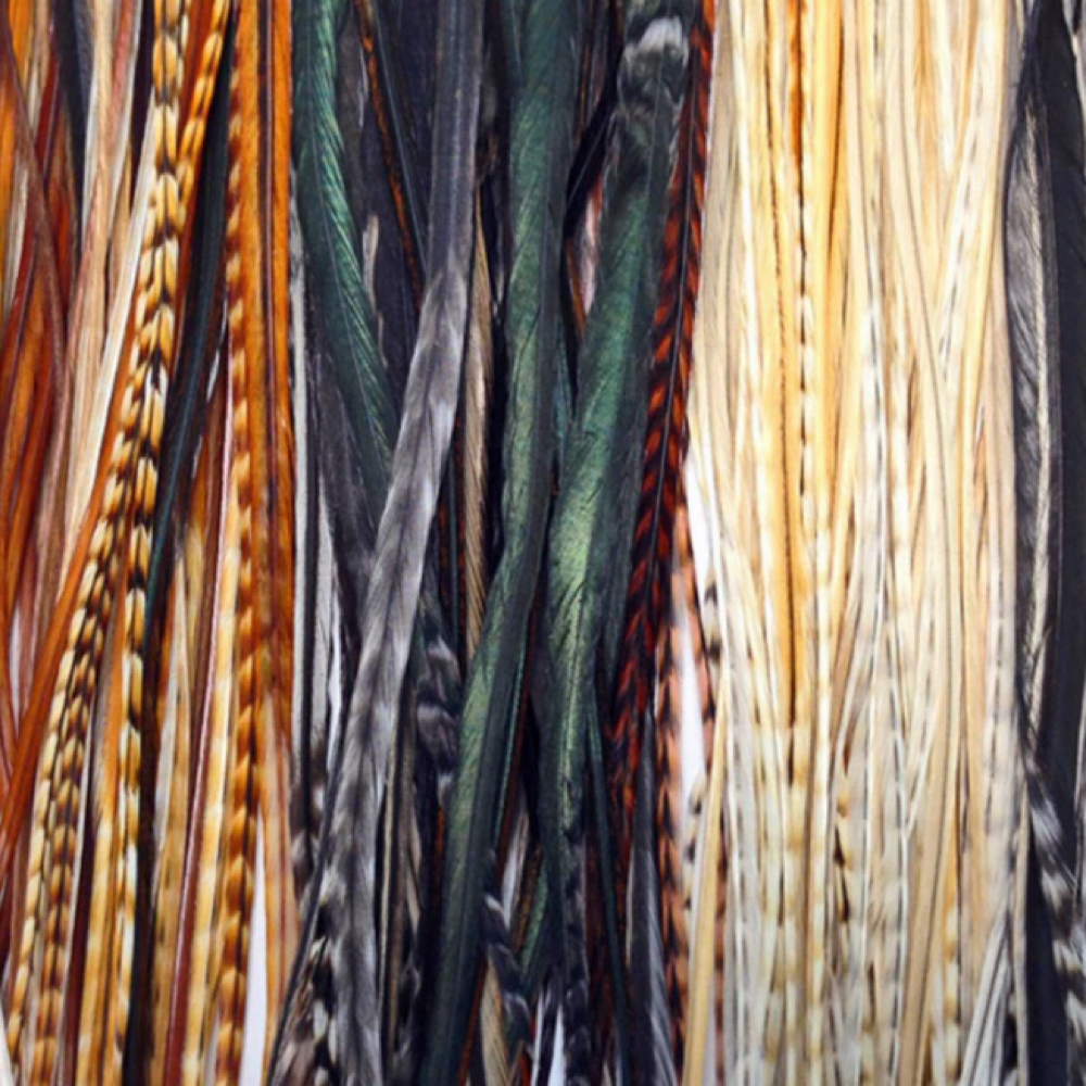 Single-Real Feather Extensions at Hair by Kami in Marshfield, WI