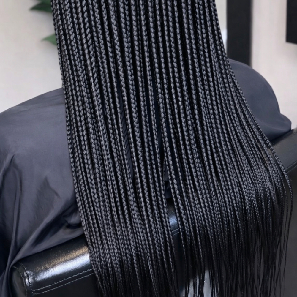 Small Knotless Box Braids Midback at G'Nels  Braids Studio in LYNNWOOD, WA