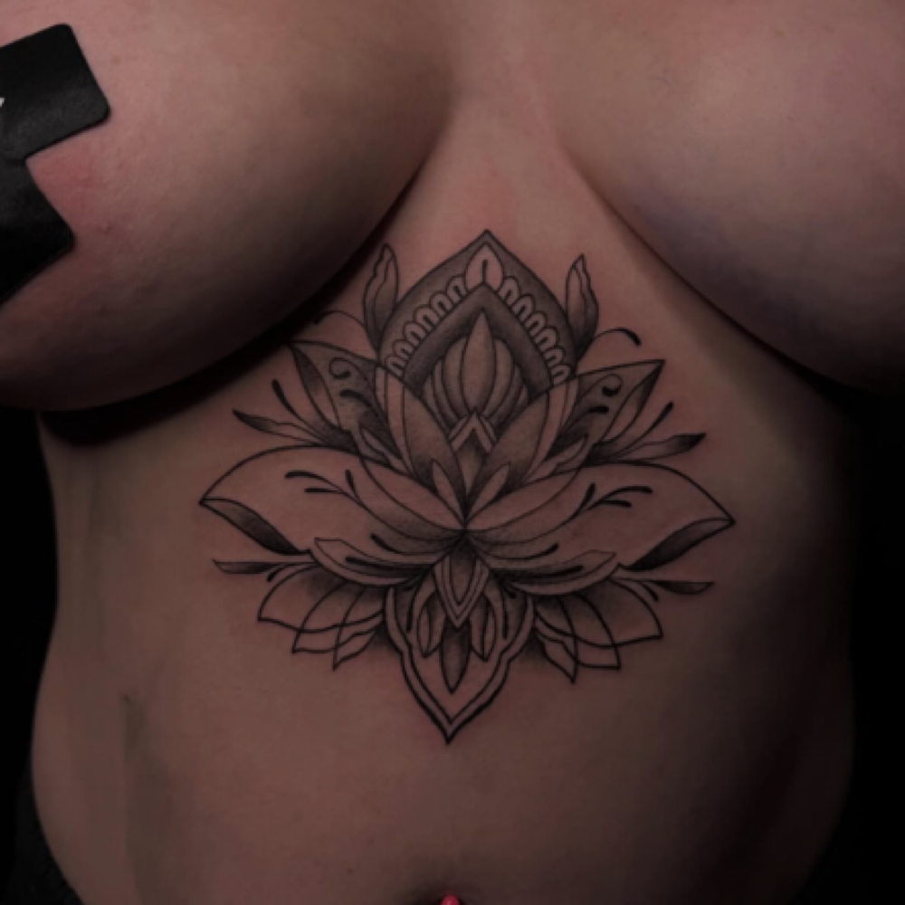 Sternum tattoo at Rilla Tatted it in fayetteville, NC