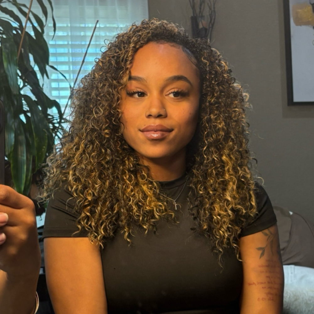 Curly Flip Over Natural Sew-In at The Arie Beauty Bar in Sacramento, CA