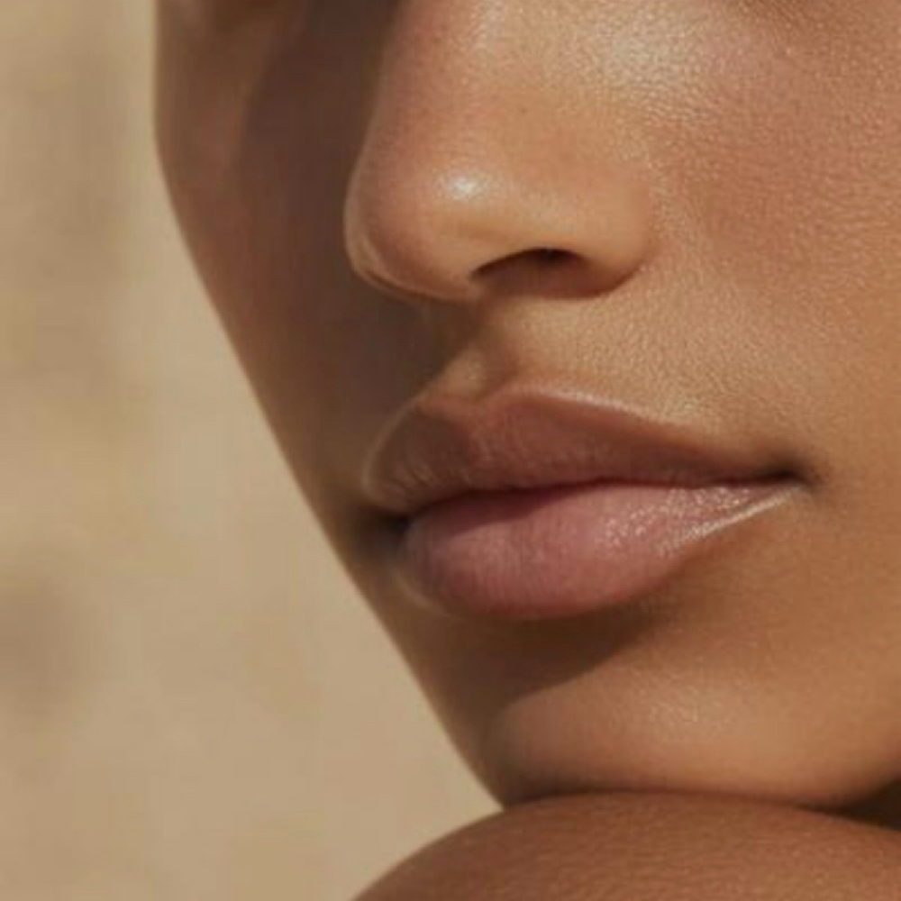 Custom Spray Tan - The Face Glow at The Emerald Beauty Lounge in Waterford, MI