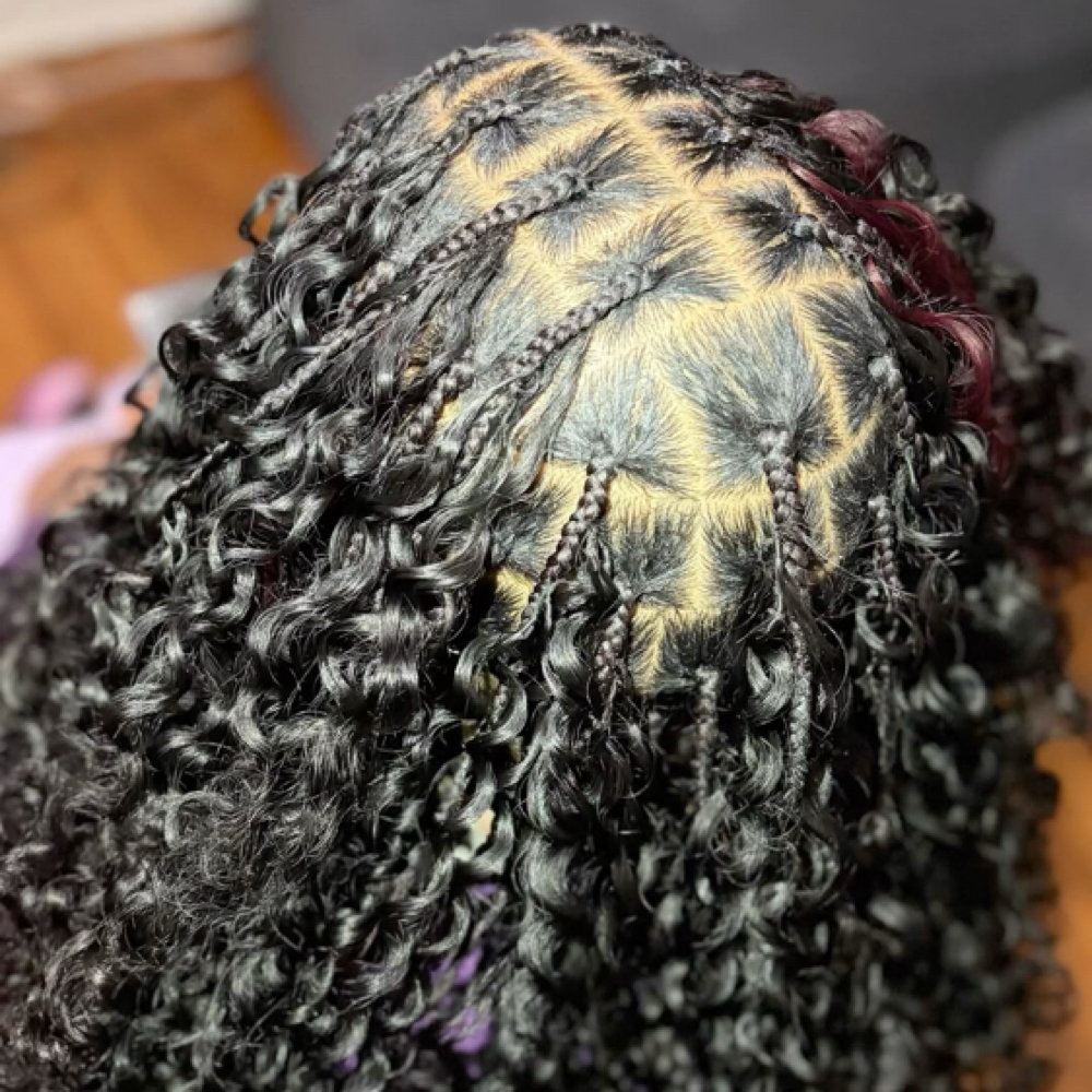 Smedium Miricale knots at TheHairDistrict in Greensboro, NC