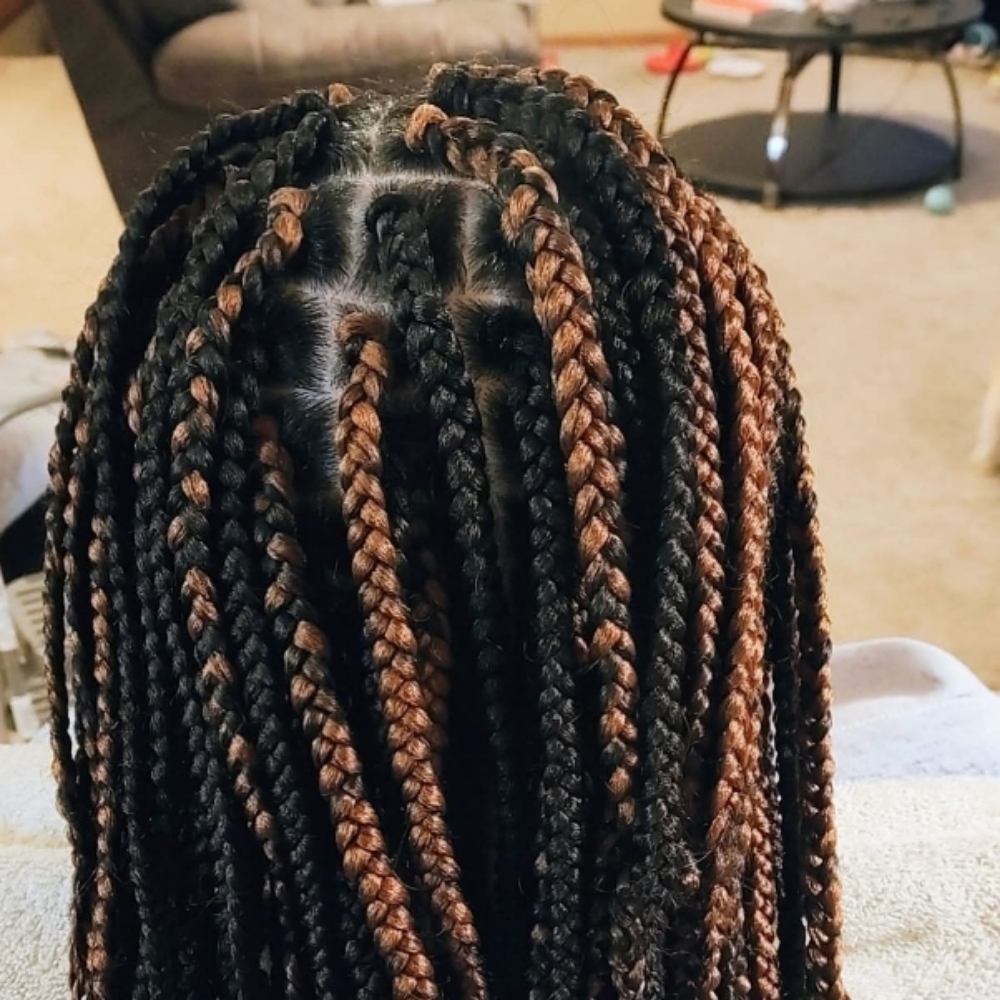 Medium Traditional Box Braids at Smiles & Styles in Sioux City, IA
