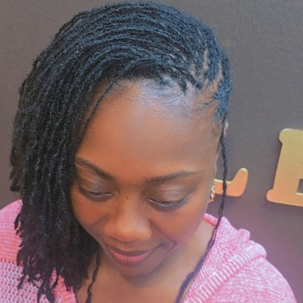 Micro locs at The collective salon and barber spa inc in Locust Grove, GA