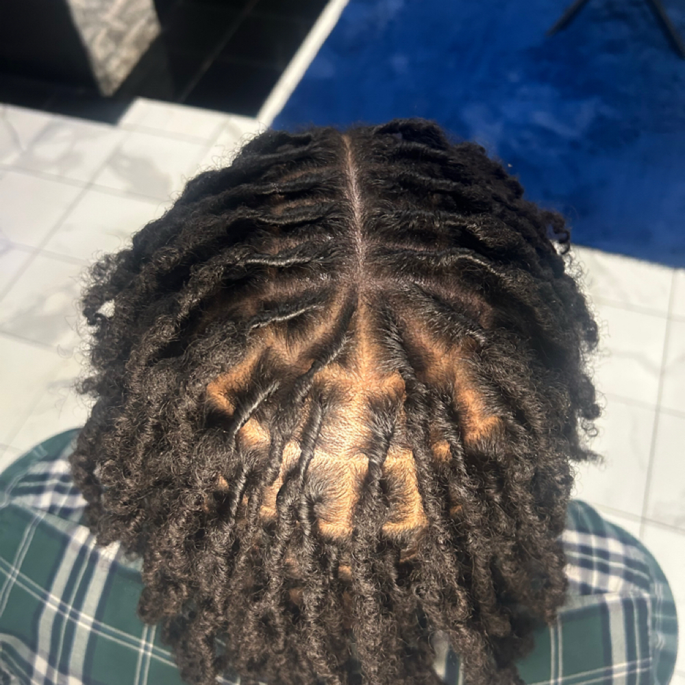 Retwist at Loc’d in with Ariel in Olive Branch, MS