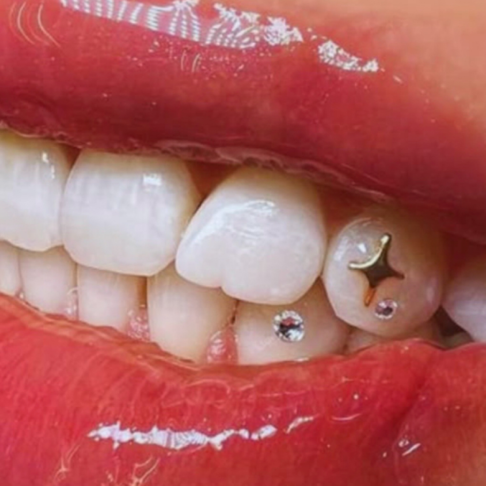 18k Gold / White Gold Charm at Rooted Cactus Esthetics in Abilene, TX