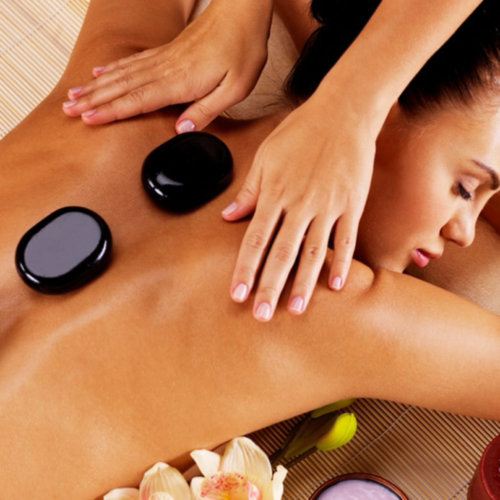 Hot Stone Massage at Unique Clinique Aesthetics in Brooklyn, NY