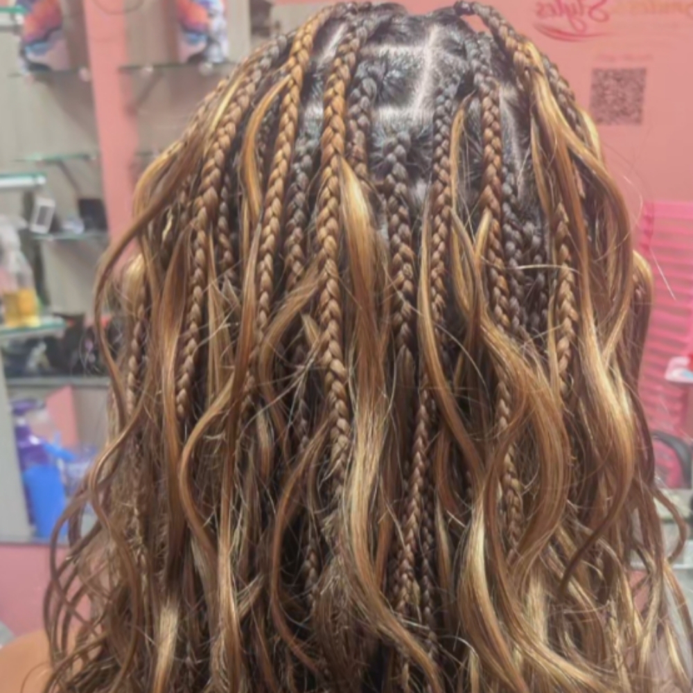 Short boho braids at Smiles & Styles in Sioux City, IA