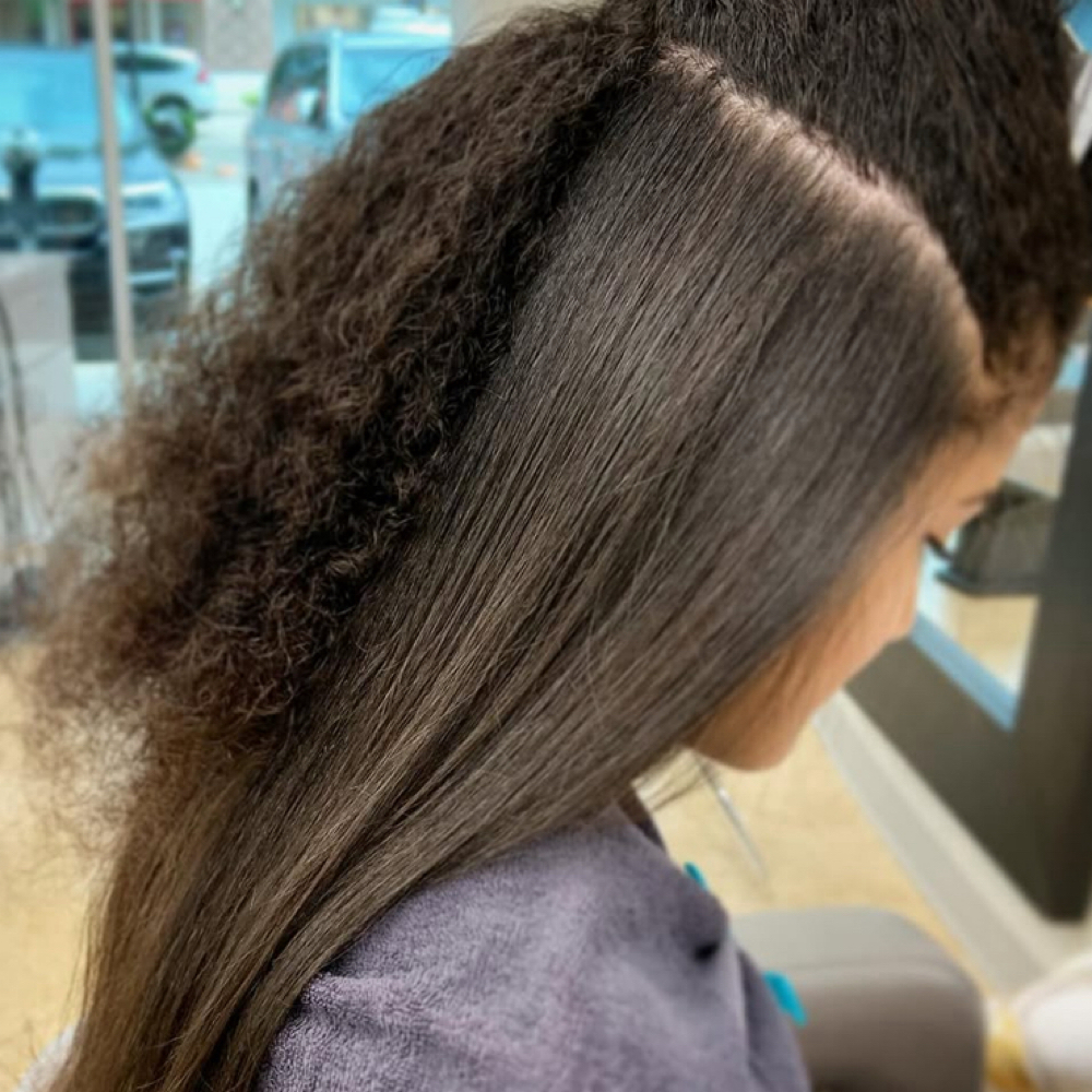 Silk Press at Crystal Rose Beauty in Pearland, TX