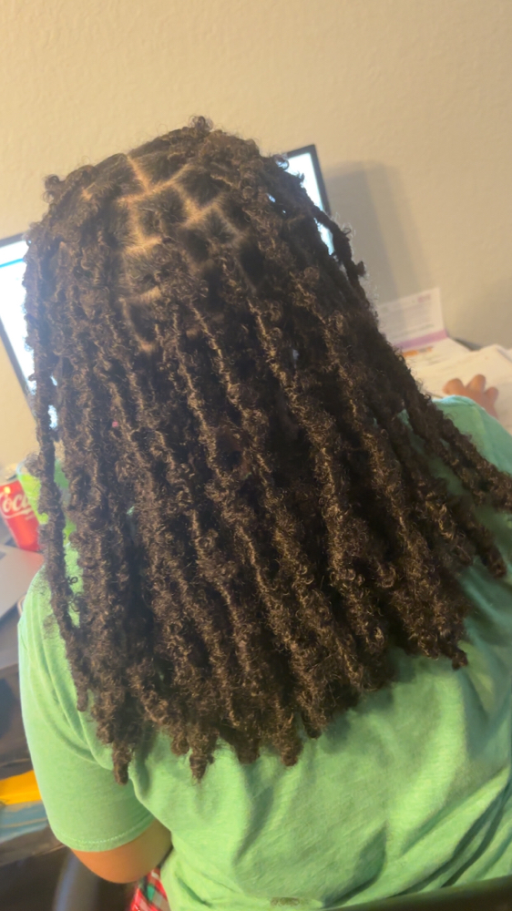 Butterfly Locs (shoulder Length) at Unique’ Creationz by Jhene’ in Jacksonville, AR