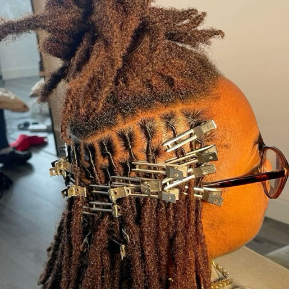 Lock Retwist Whole Head at Zara Hair Braiding Salon in 30328
