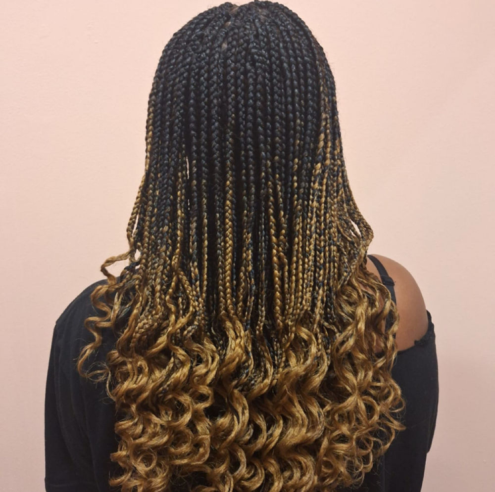 Box Braids – Medium (Mid-Back) at WestAfrican Beauty Junction Braids in Prosper, TX