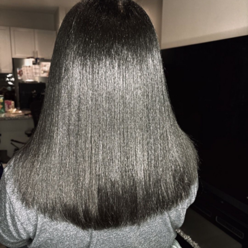 Silk Press at Styles By Yours Truly in Houston, TX