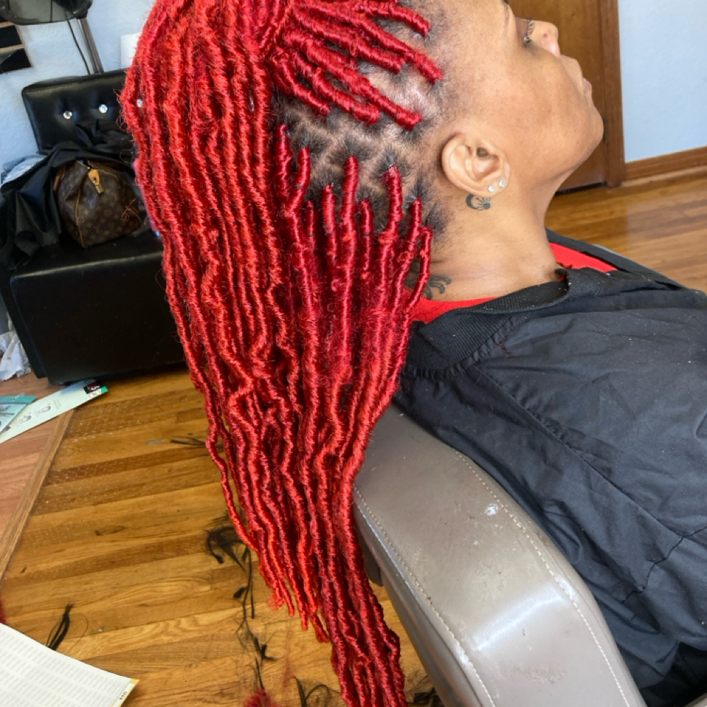 Faux locs done with synthetic hair at TheBraider Hair Academy in Duncanville, TX