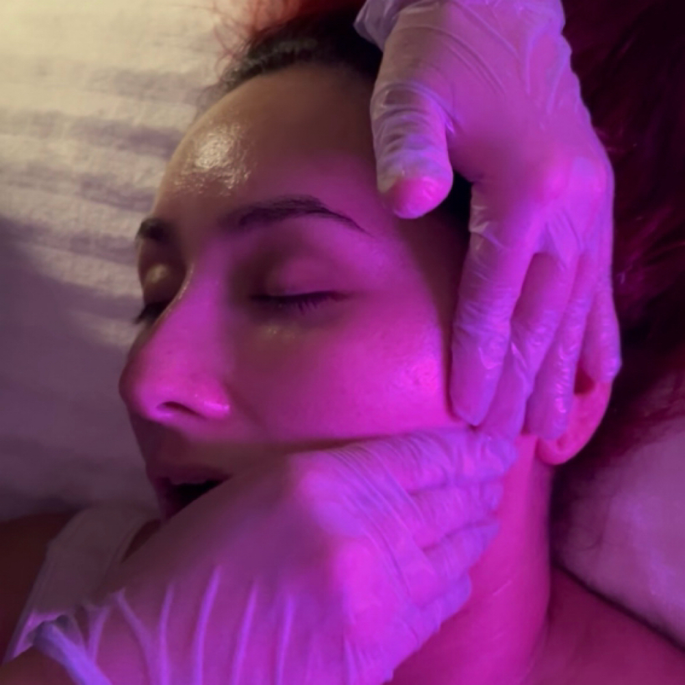 Buccal Face masage at Aura Skin Studio in Lutz, FL