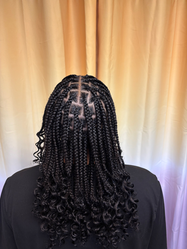Medium Knotless braids