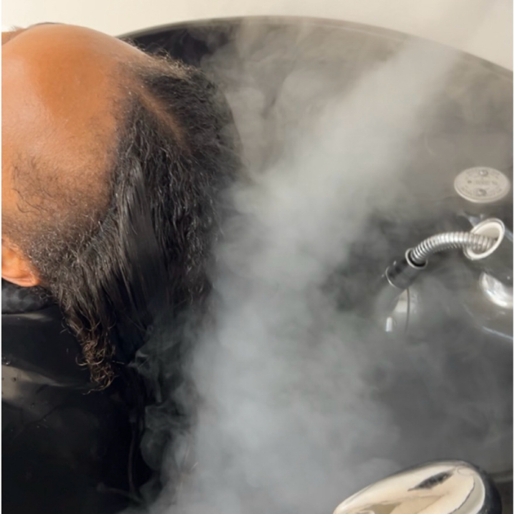 Sewin Install Shampoo at Eanaj Hair Studio in Houston, TX