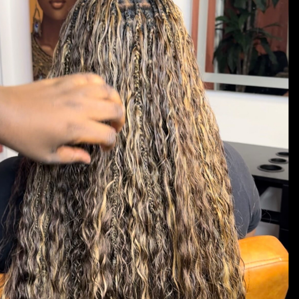 Fluffy Human Braids (Midback) at Chrisma Braids in Irvington, NJ