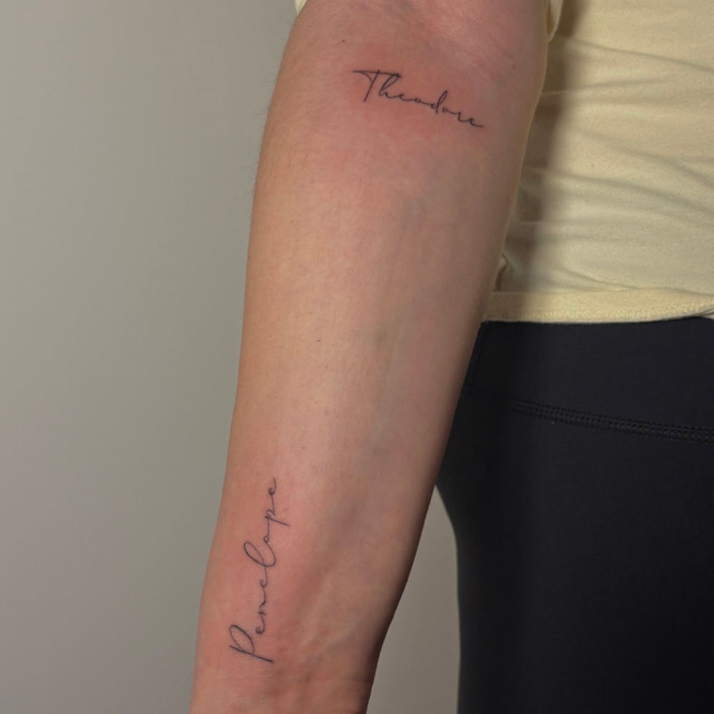 small script at Pinstripe Tattoos in Shelby Township, MI