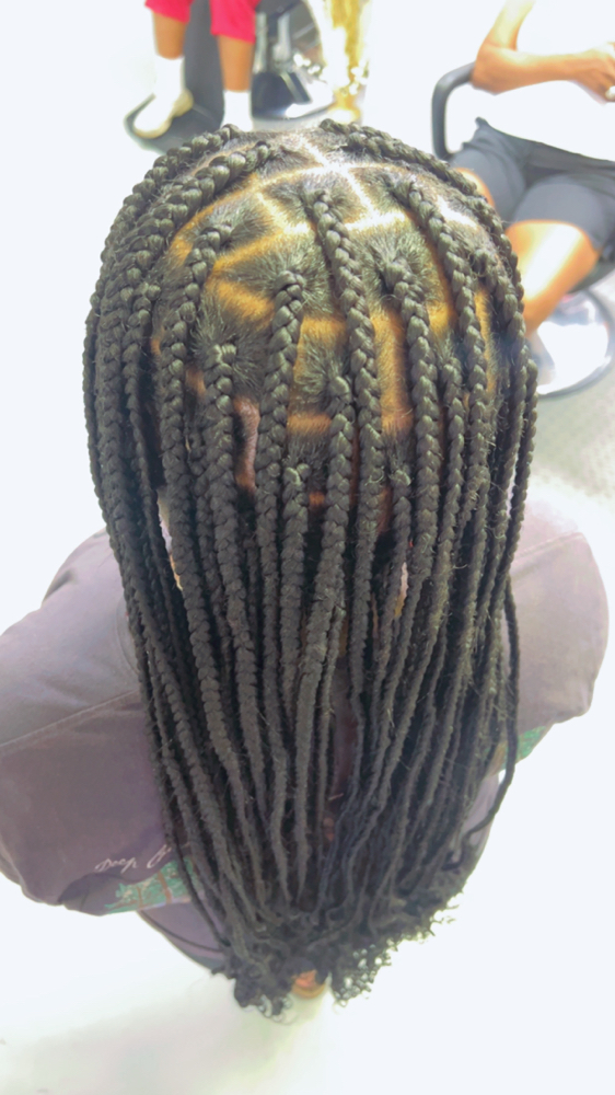 Knotless Braids at The Xperience Salon & Spa in Murfreesboro, TN