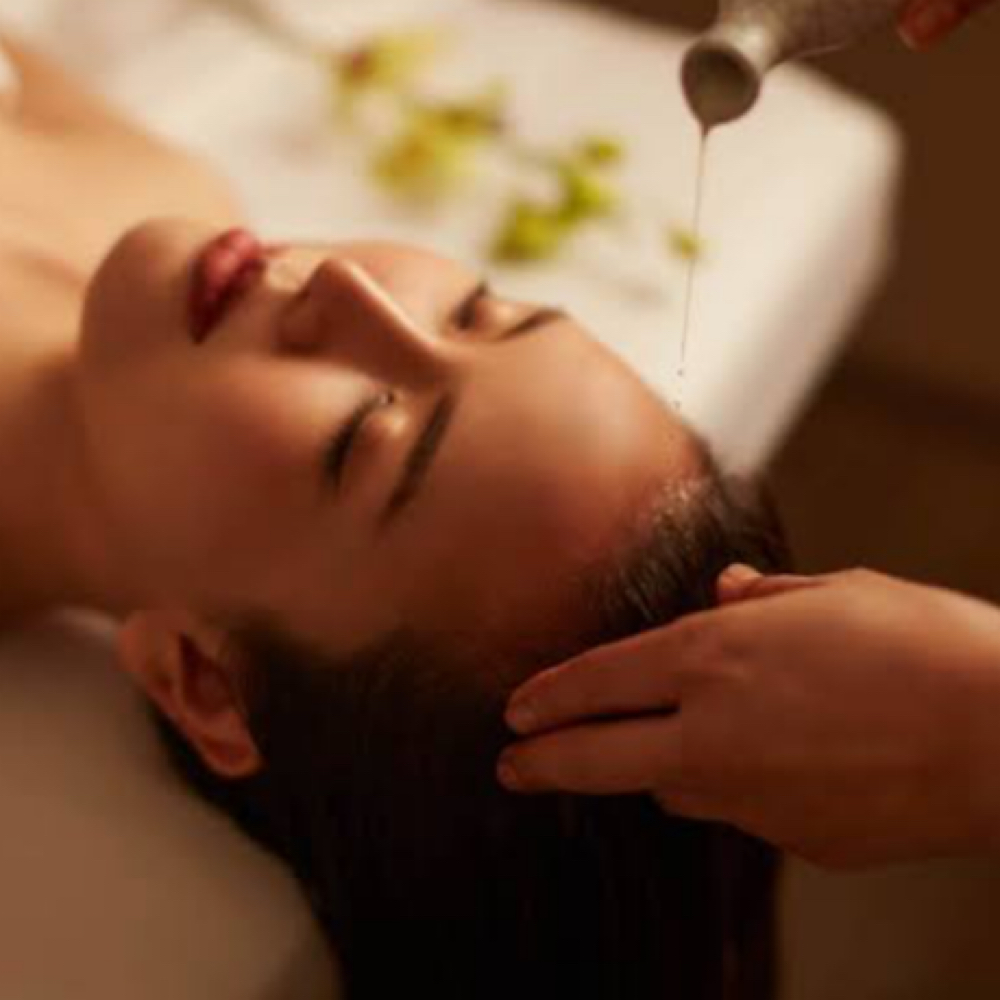 Lily Luxe Signature Warm Oil Scalp at Lily Luxe Beauty in Durham, NC
