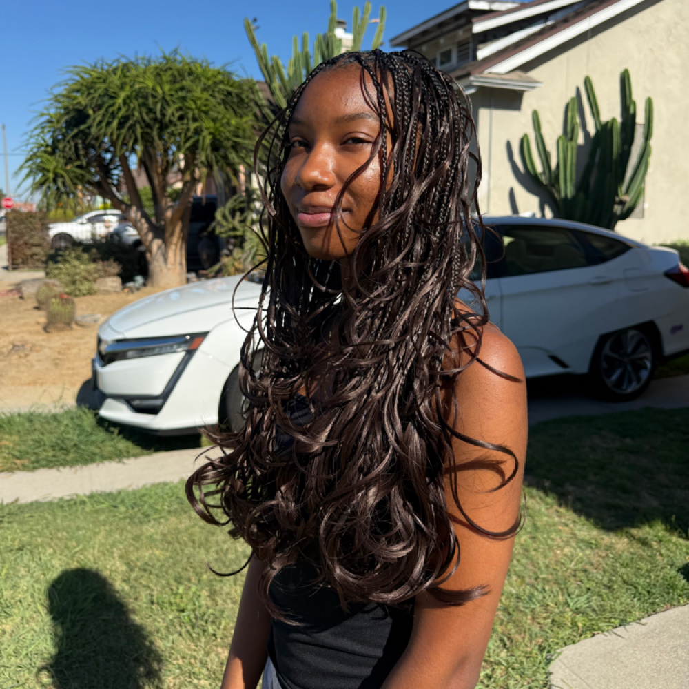 Smedium Boho Knotless French Curls at kailibraidshair in Los Angeles, CA
