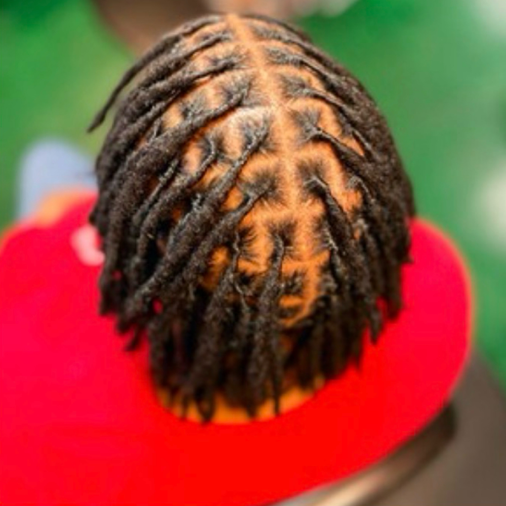 Re-twist Medium/Large Locs at Butterfly Styles | Natural Locs in Long Beach, CA