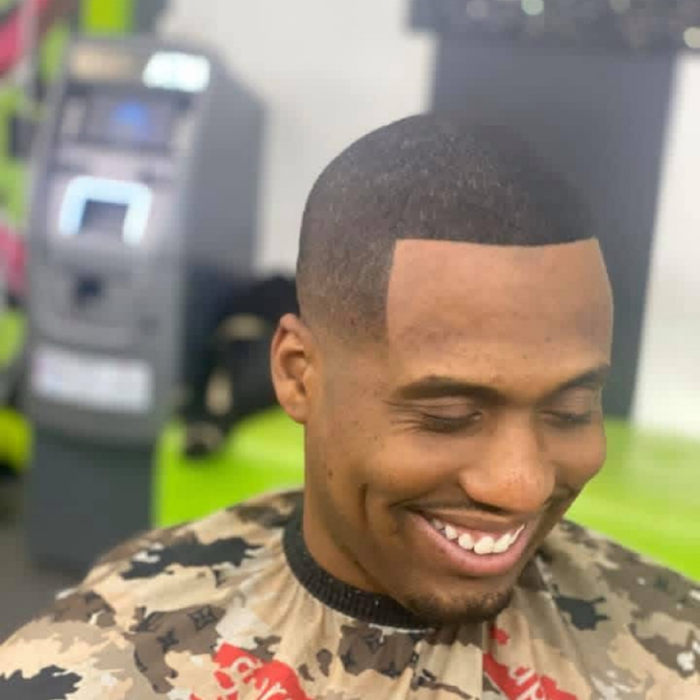 Full Haircut at Africana Star Salon in Los Angeles, CA