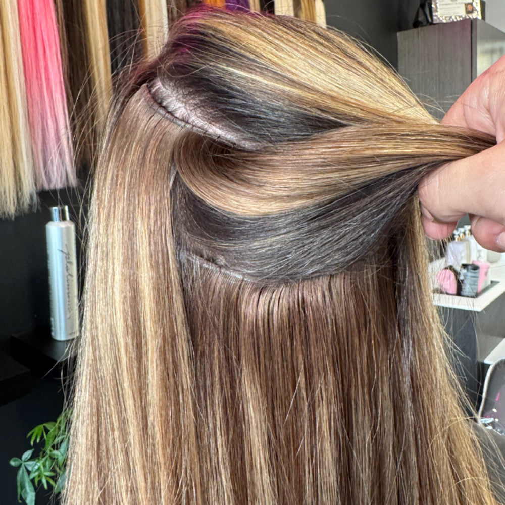 Re-Install 2 Row Sew-in Extensions at David Andreas Hair in Dallas, TX