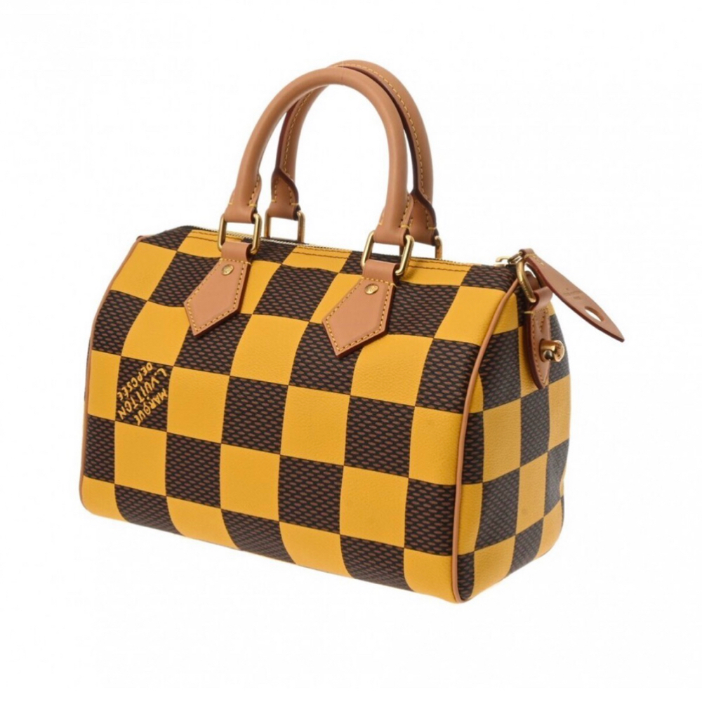 Yellow & Brown at LASHES AND SOLES in PIKESVILLE, MD