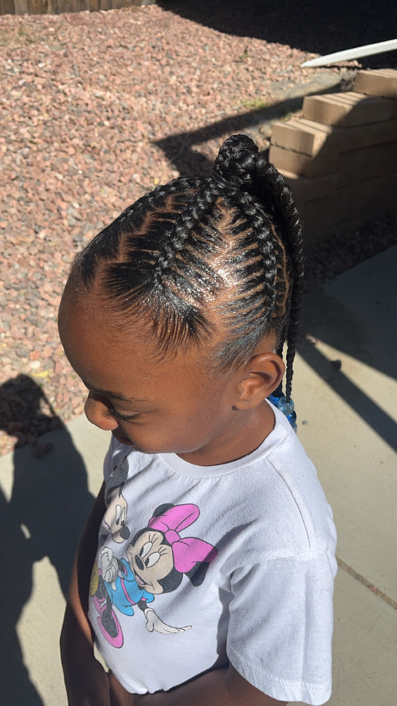 Creative braided ponytail at Golden Combs in Fountain, CO