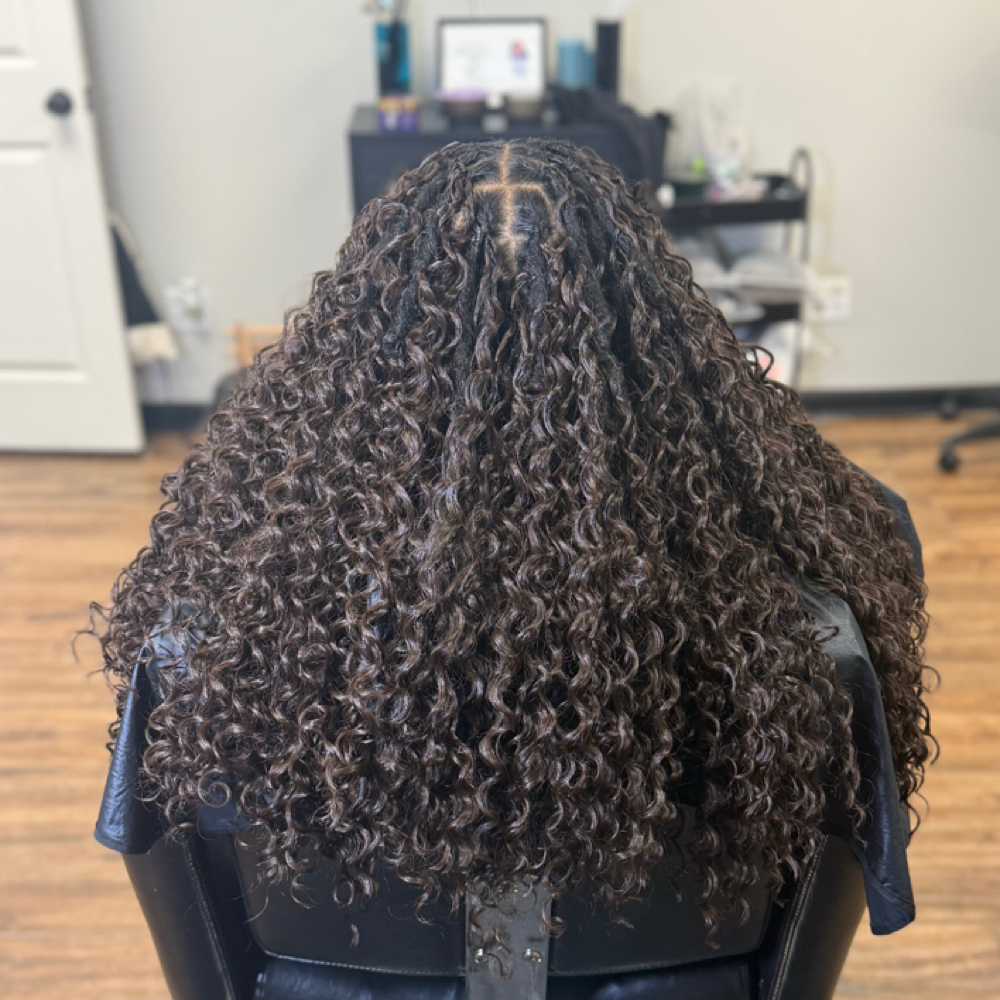 Miracle Knots On Locs at Elegance Redefined in Belden, MS
