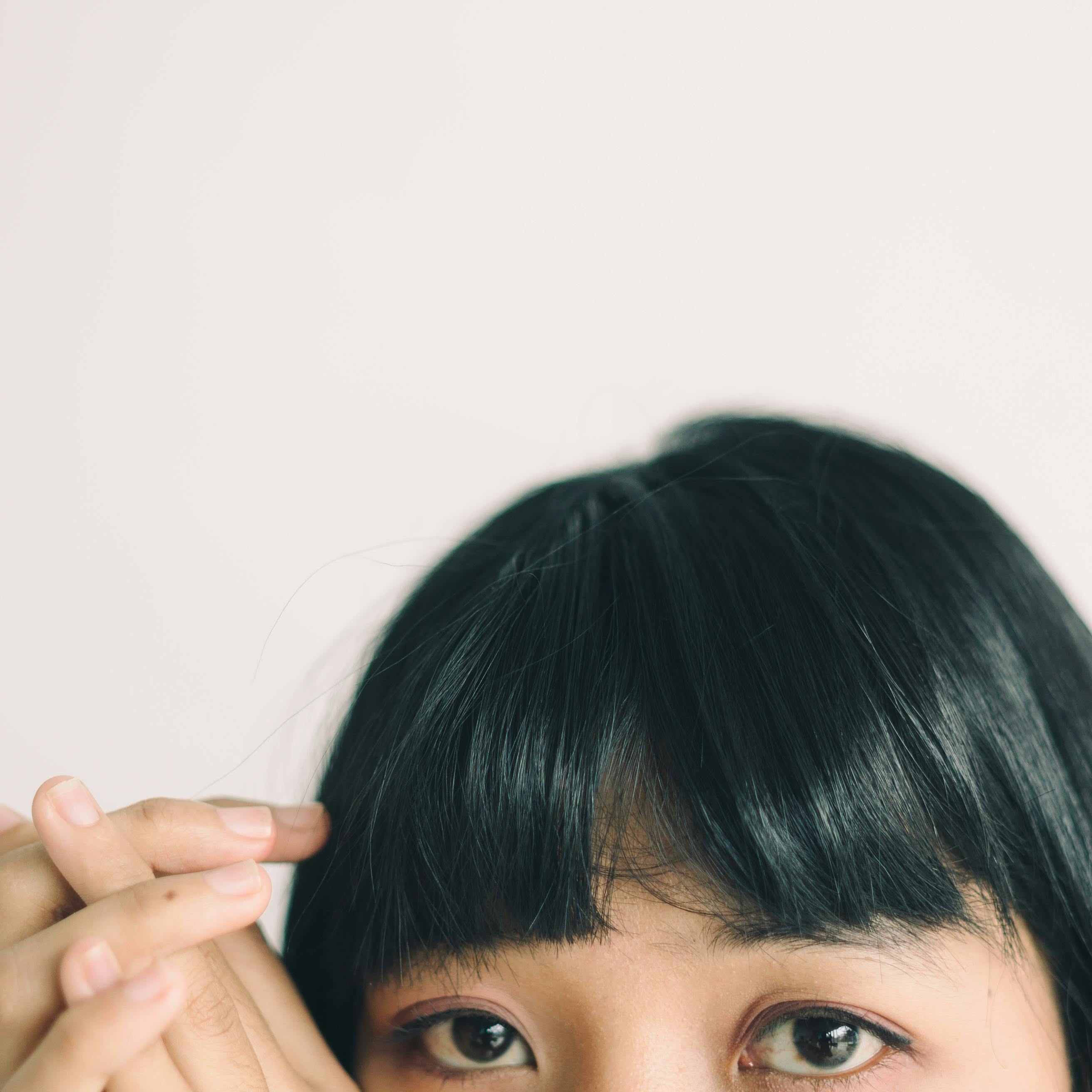 Bang trim at Hair by Jacquera in Rome, GA