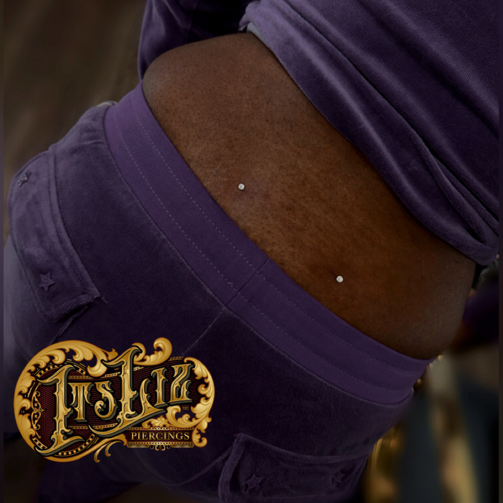 Lower Back Dermals (Both) at Itslizpiercings in Houston, TX