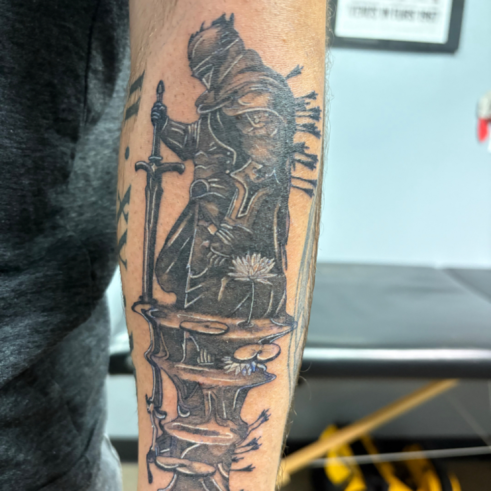 “Large” Tattoo at Golden Tattoo & Piercing in Iowa City, IA
