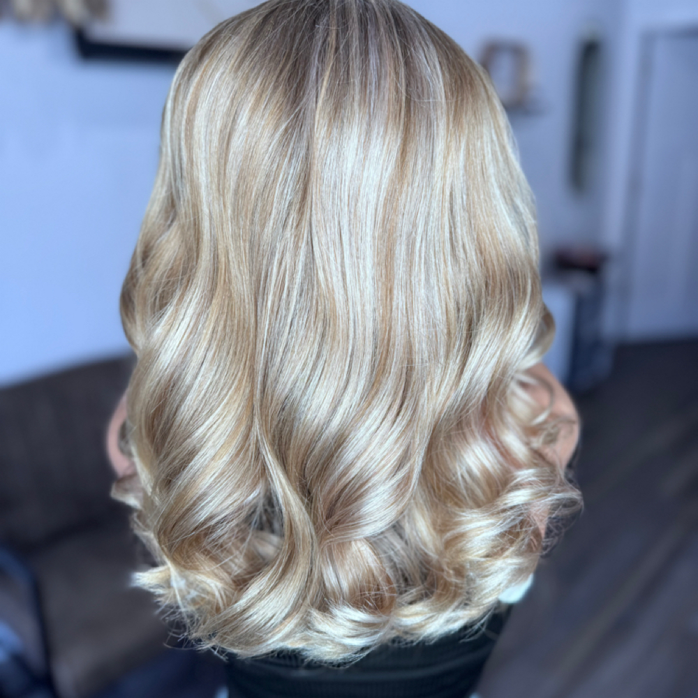 All over highlight at Serenity Salon in Akron, IA
