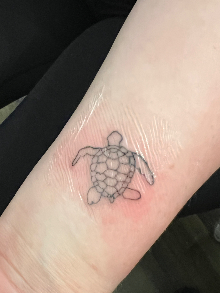 Fine Line Tattoo