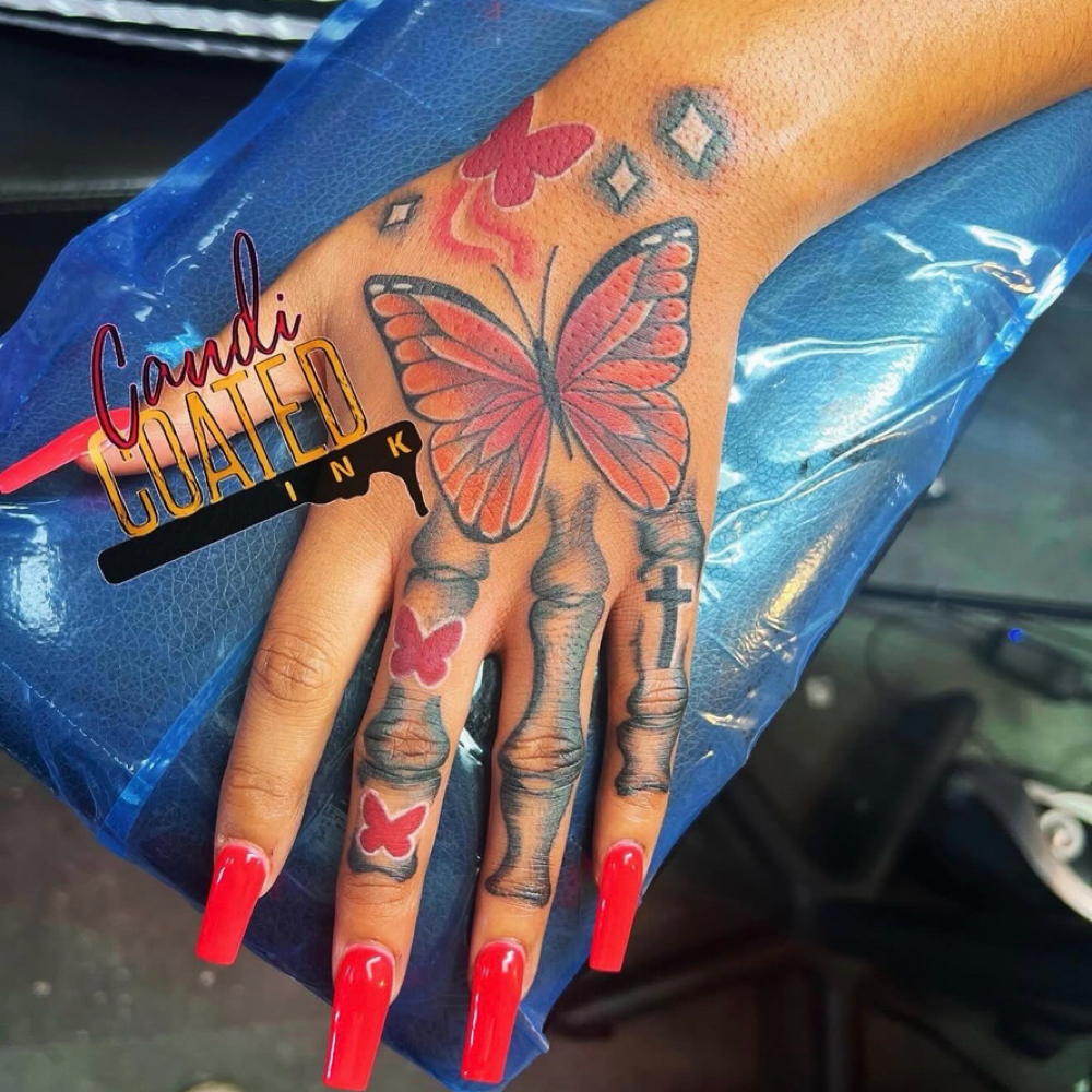 Hand Tattoos at Candi Coated Ink in Detroit, MI
