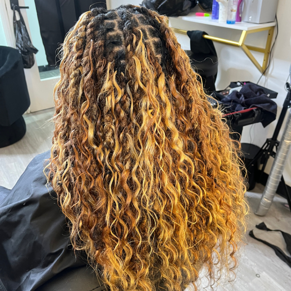 Loc Extensions & Specialty Styles at Crowned by Kiy in Rosedale, NY