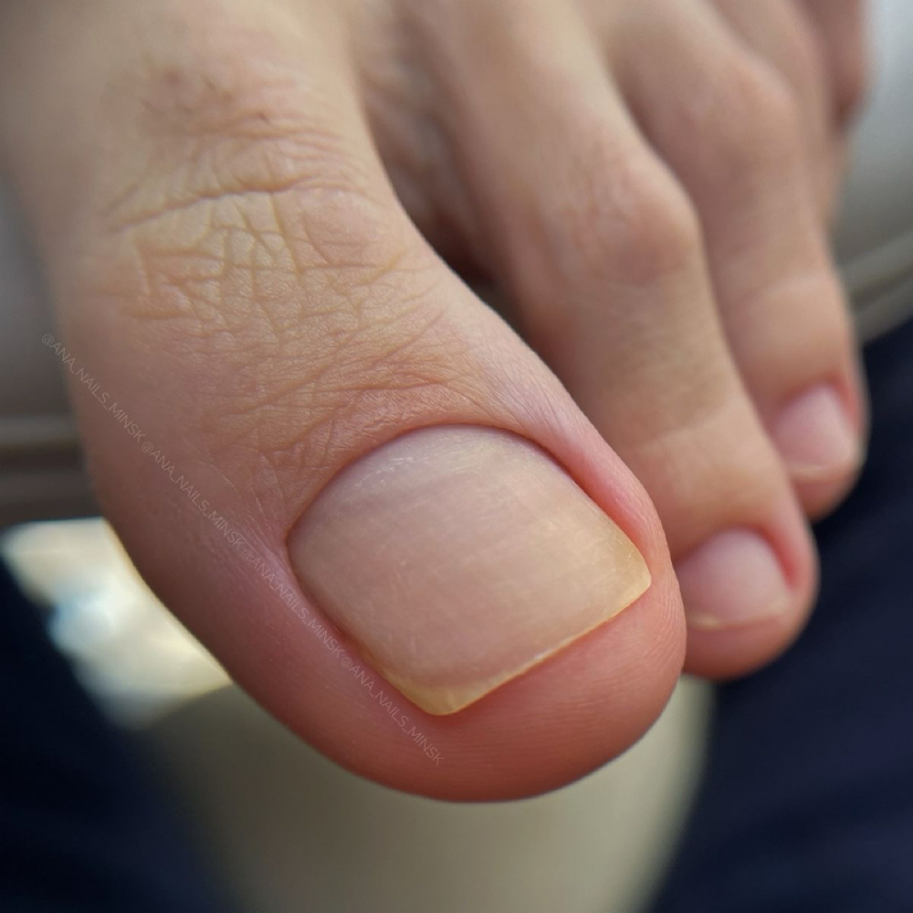 Man Pedicure Cleaning at I Know Nails in Sarasota, FL
