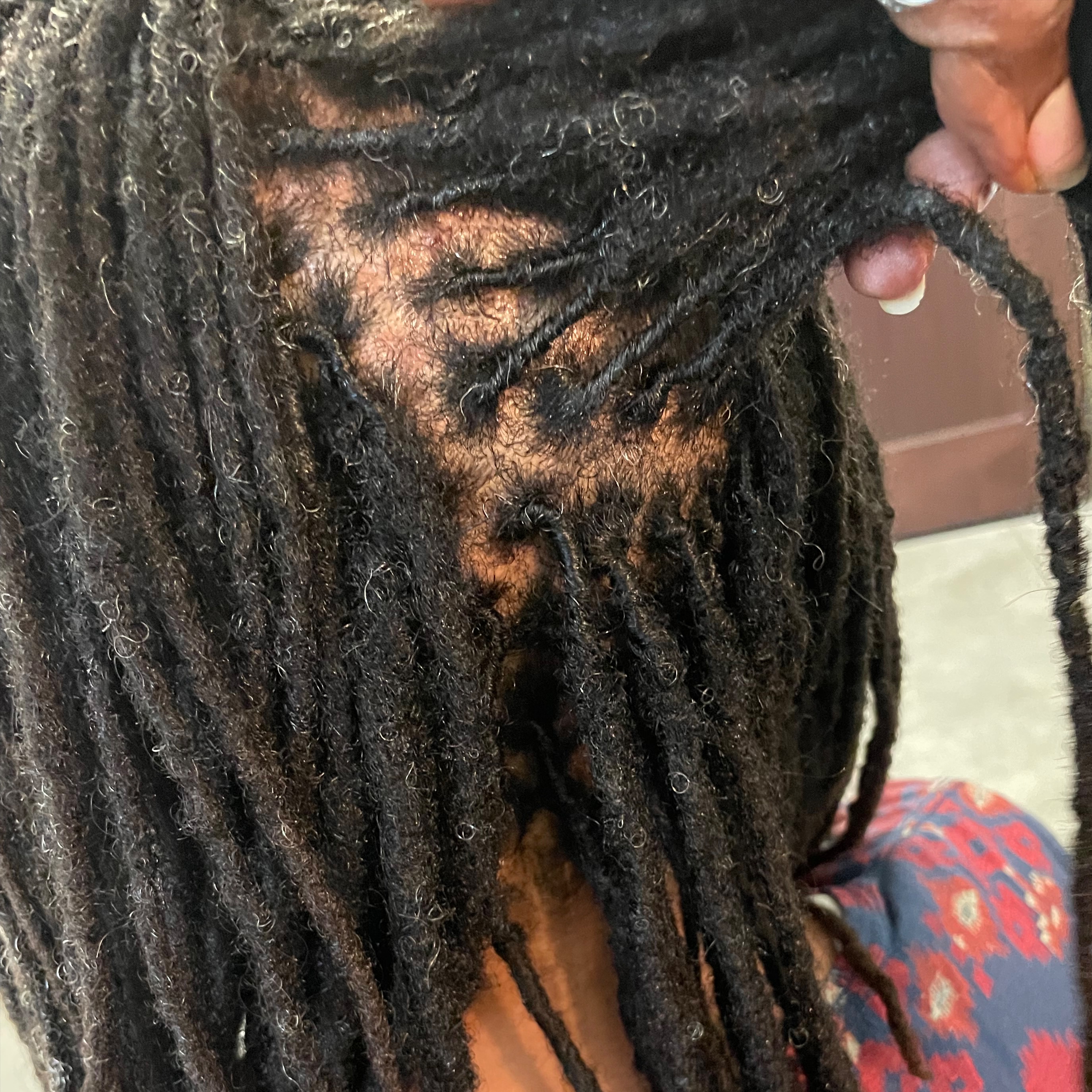 LOC RETWIST/PALM ROLL METHOD at AfroDeziac in St. Louis, MO