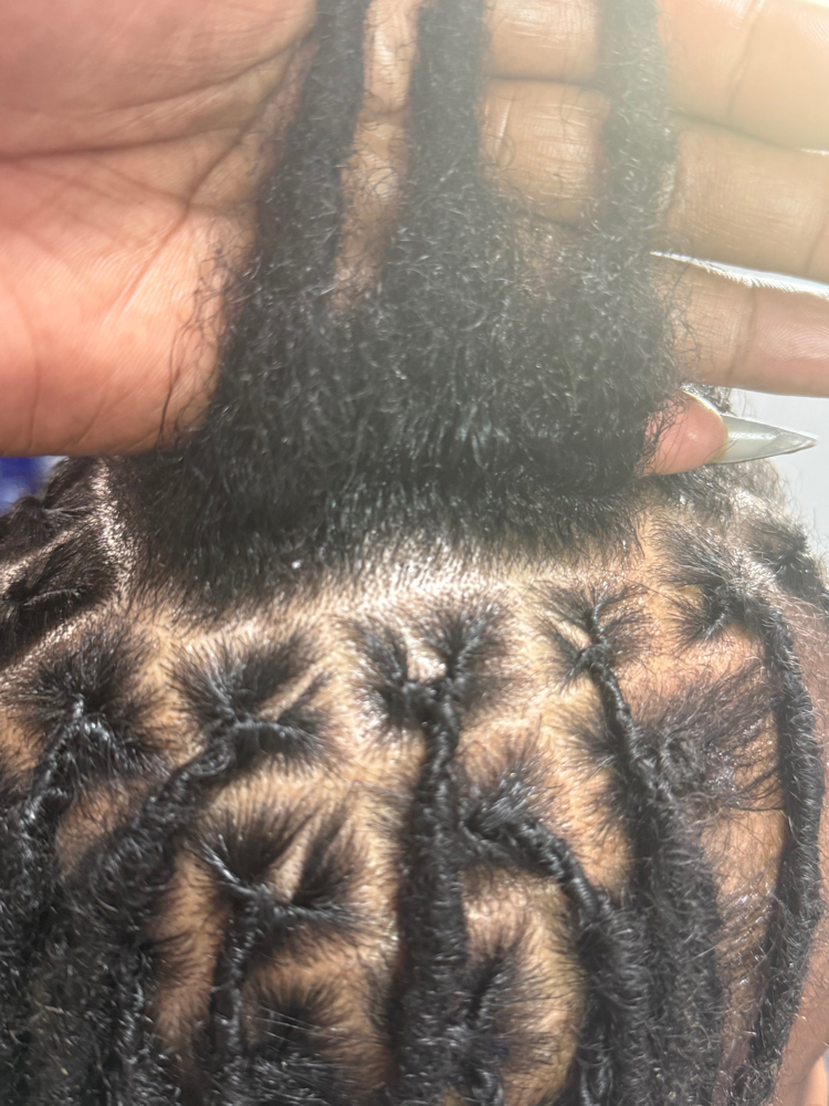 Transition From Retwist To Interloc at Anointed Hands in Southaven, MS