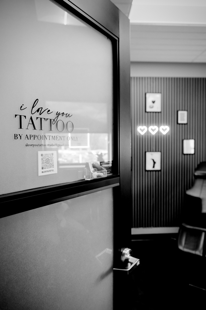 Micro Initial Tattoo