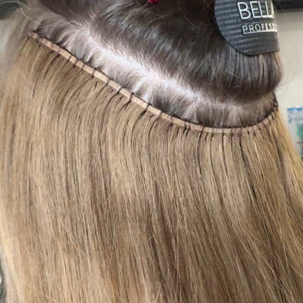 Extension Re-sew: 1 Row at Teresa Uptown Hair in Beavercreek, OH