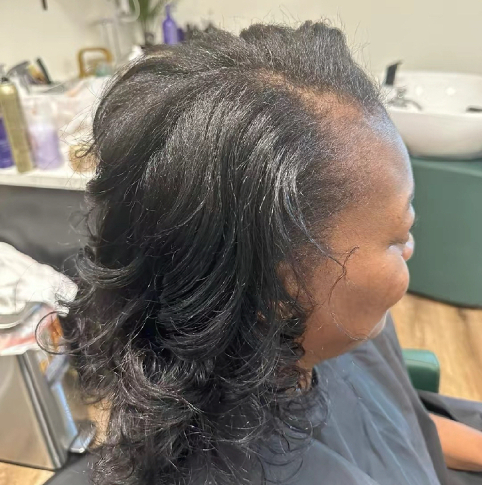 Blow Out On Relax Hair at SJ Hair Studio in North Carolina, NC