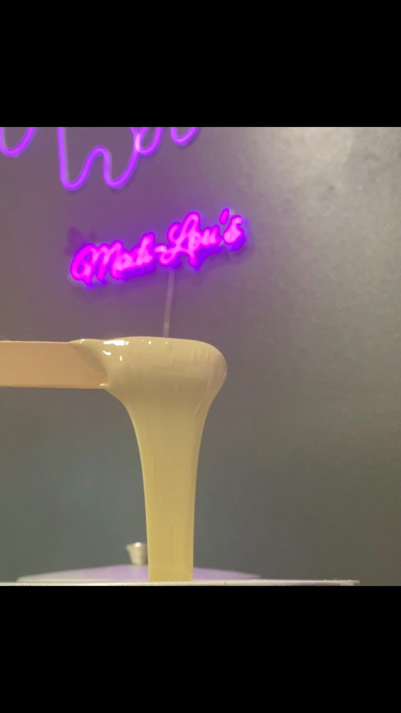 Side Burns Wax at Madi-Lou's Studio in Austin, TX